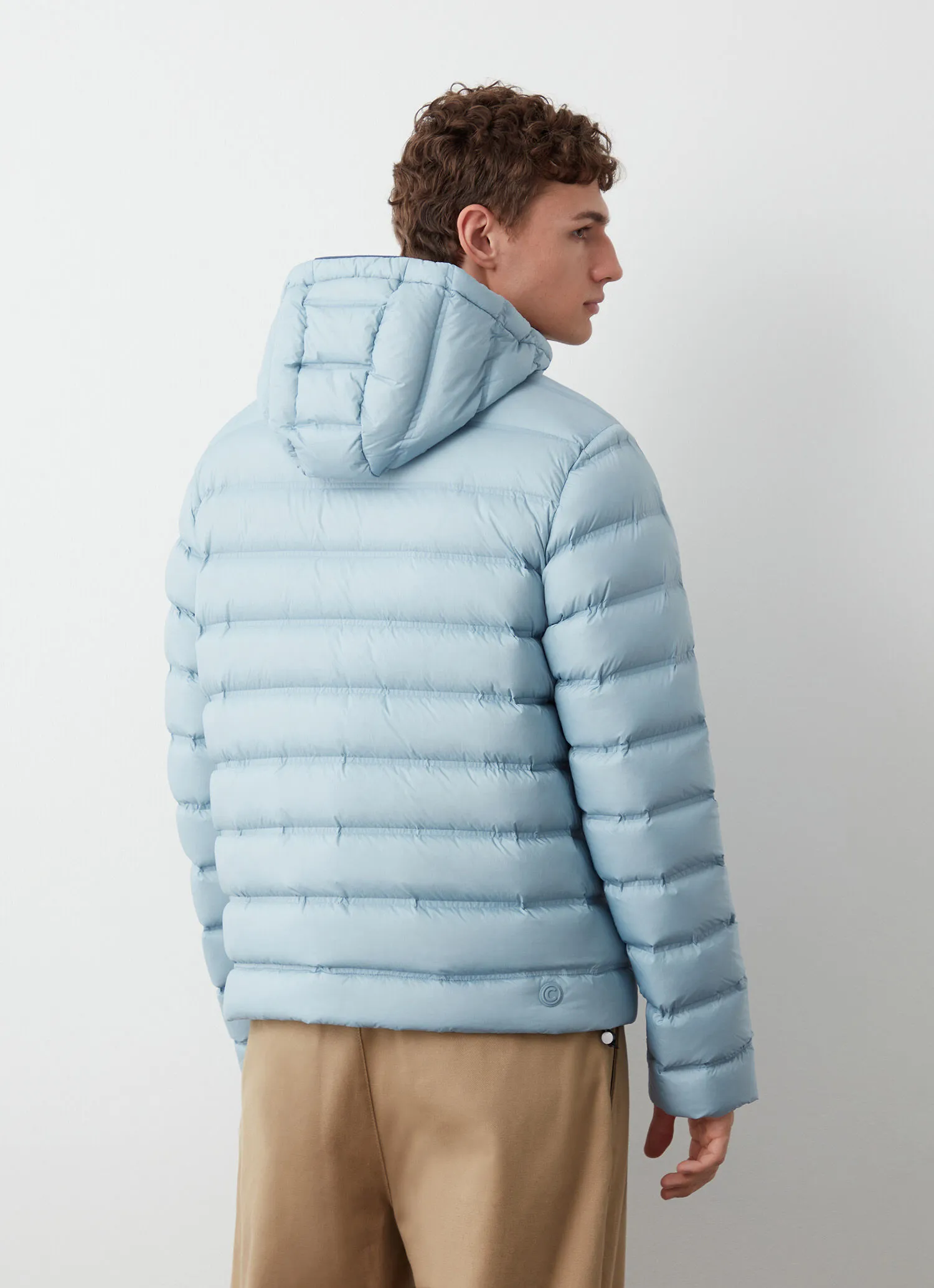 Down jacket with seamless quilting-